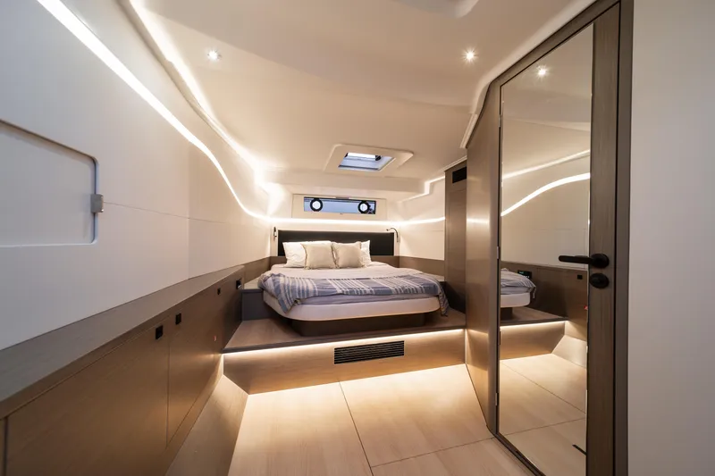 Slide: The Image of Luxurious interior of 2026 Beneteau Gran Turismo 40 yacht cabin with modern design. - 50