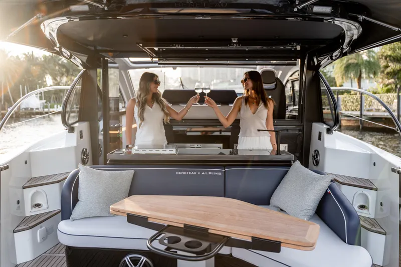 Slide: The Image of Women toasting on a 2026 Beneteau Gran Turismo 40 yacht, enjoying a luxurious cruise. - 51