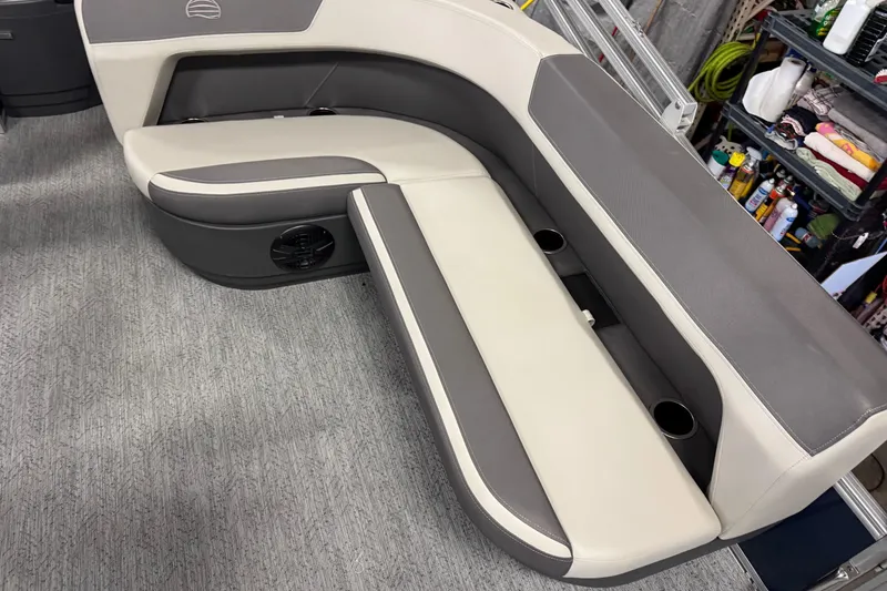 Slide: The Image of 2026 Sun Tracker Bass Buggy 18 DLX boat interior seating with cup holders. - 10