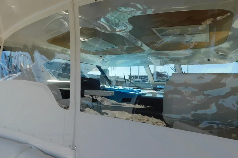 Slide: The Image of Interior view of 2009 Tiara Yachts 4300 Sovran, showcasing seating and windows. - 27