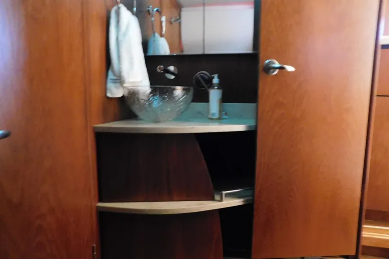 Slide: The Image of Luxurious wooden bathroom interior on 2009 Tiara Yachts 4300 Sovran. - 37