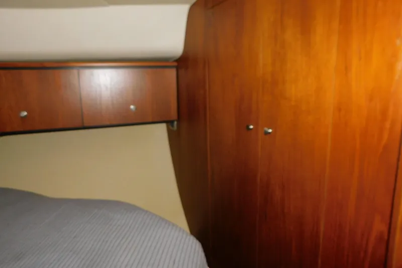 Slide: The Image of Interior cabin of 2009 Tiara Yachts 4300 Sovran with wooden cabinetry. - 49