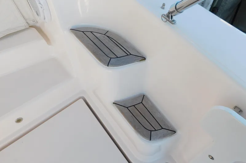 Slide: The Image of 2009 Tiara Yachts 4300 Sovran boat deck with non-slip steps and stainless steel railing. - 62