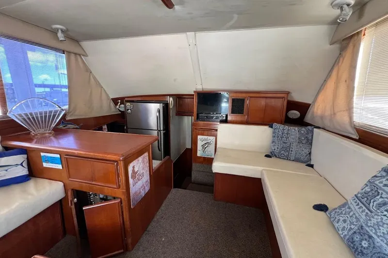 Slide: The Image of Interior of 1988 Post 46 ll yacht with cozy seating and modern amenities. - 5