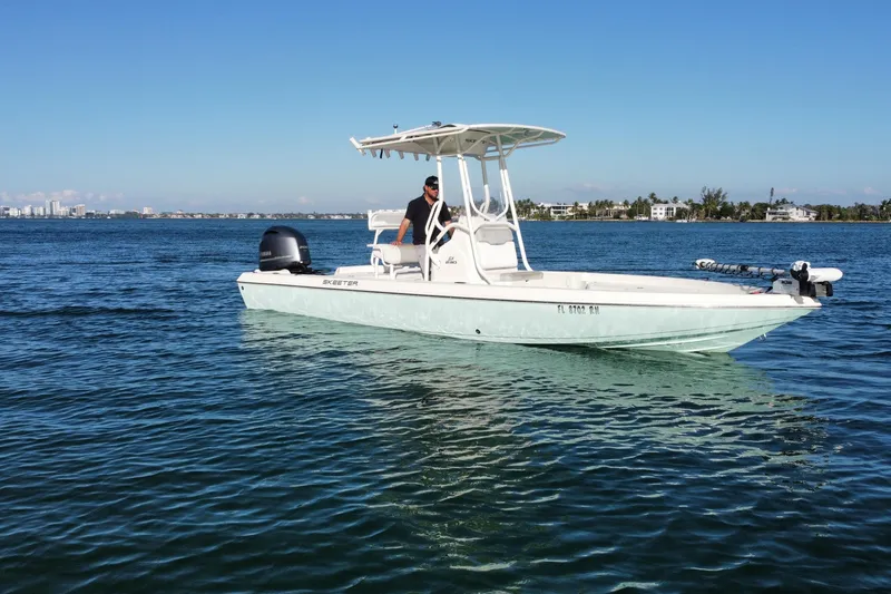 The Image of 2017 Skeeter SX230 boat in clear turquoise water near mangroves under blue sky. - 0