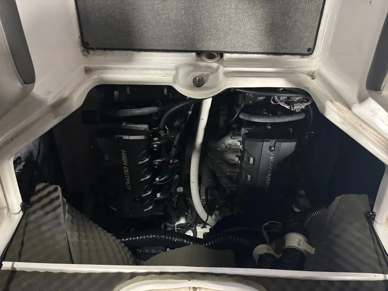 Slide: The Image of Engine compartment of a 2020 Yamaha AR240 boat, featuring high output engines. - 10