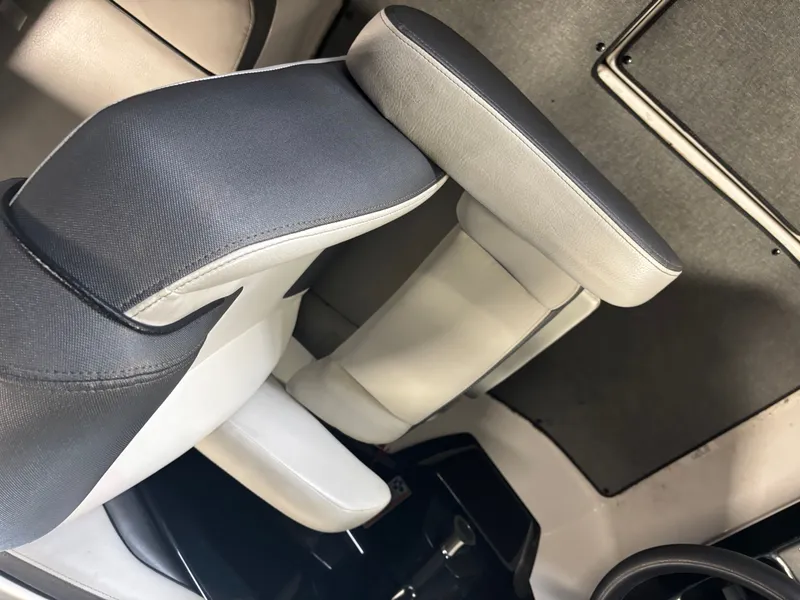 Slide: The Image of 2020 Yamaha AR240 boat interior with gray and white seating. - 11