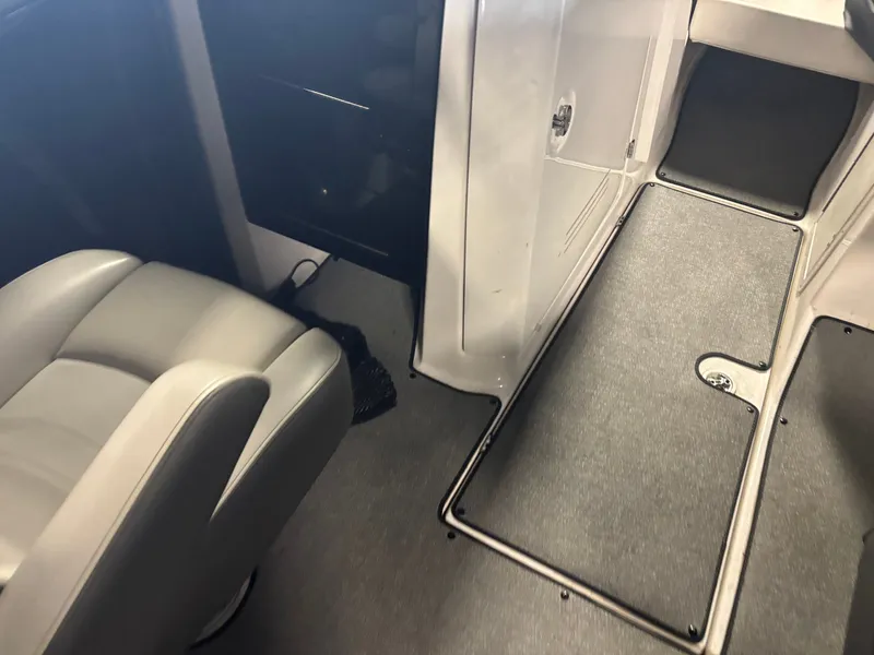 Slide: The Image of Interior of 2020 Yamaha AR240 boat showing seating and flooring details. - 8