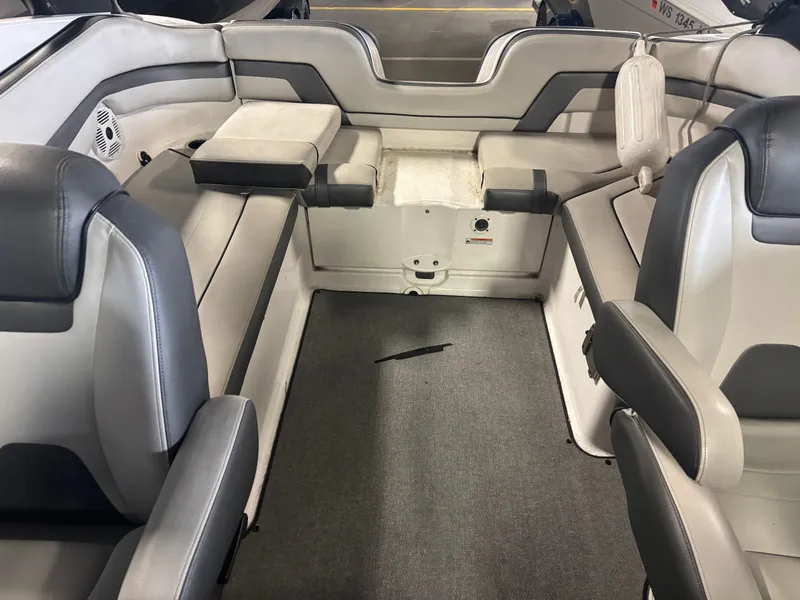 Slide: The Image of Interior of 2020 Yamaha AR240 boat with gray seating and carpeted floor. - 9