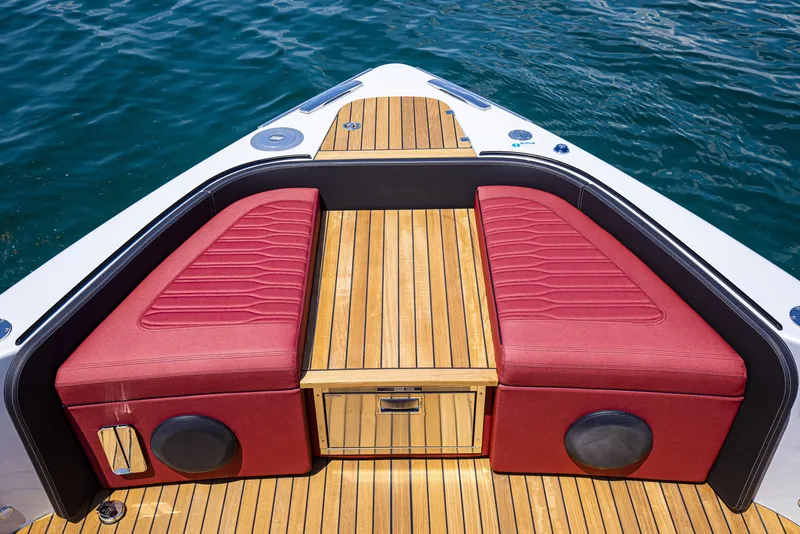 Slide: The Image of Luxurious Cranchi A46 Tender 2026 with red sunbed, ocean view, and clear blue sky. - 14