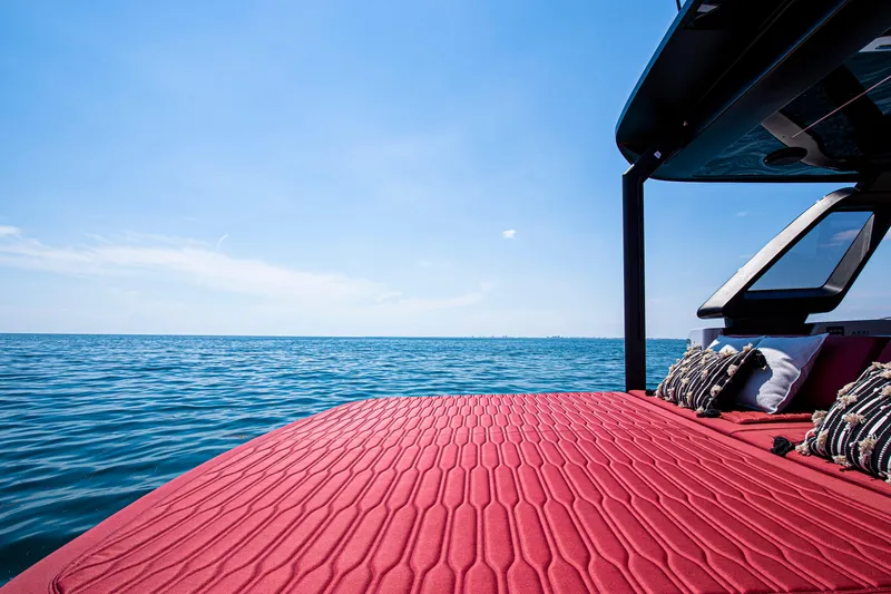 Slide: The Image of Steering wheel of 2026 Cranchi A46 Luxury Tender with control buttons. - 16