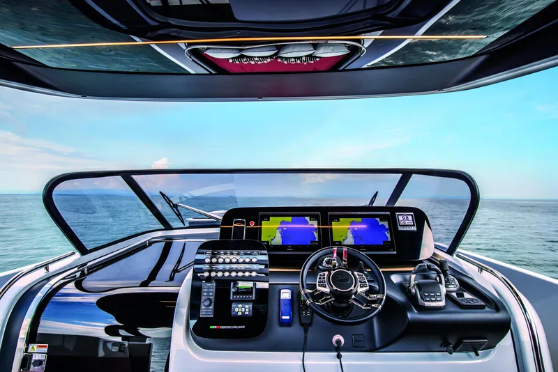 Slide: The Image of Luxurious interior of 2026 Cranchi A46 Luxury Tender with elegant seating and wood finishes. - 21