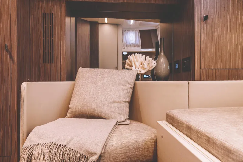 Slide: The Image of Luxurious interior of 2026 Cranchi A46 Luxury Tender with elegant wood finishes and modern design. - 24