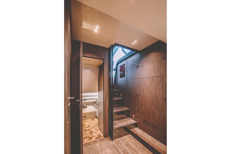 Slide: The Image of Luxurious interior of 2026 Cranchi A46 Luxury Tender with elegant bedding and modern decor. - 25