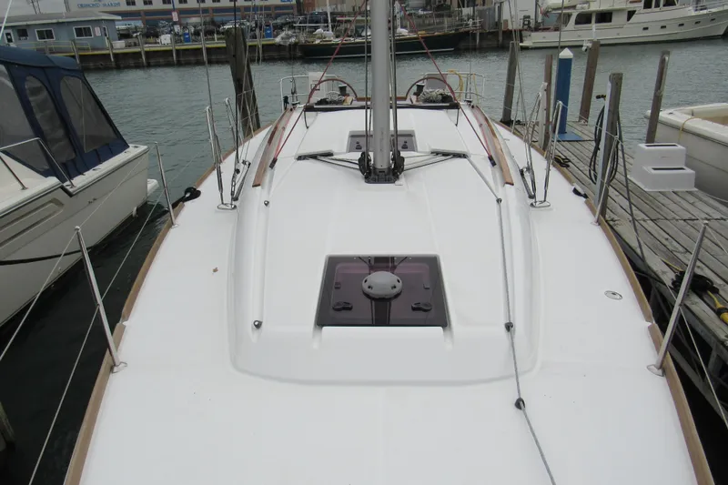 Slide: The Image of 2013 Jenneau Sun Odyssey 379 sailboat docked at marina. - 11