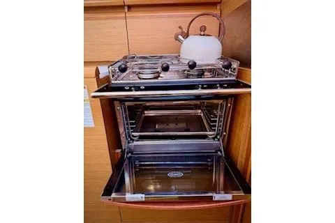 Slide: The Image of Stainless steel oven and stove in 2013 Jenneau Sun Odyssey 379 yacht kitchen. - 31