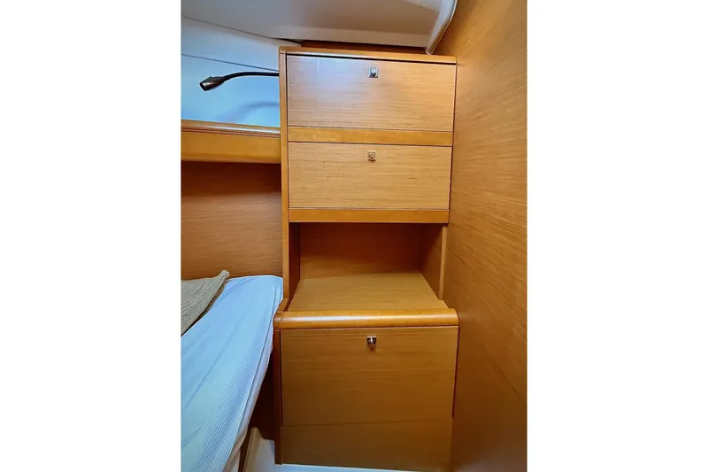 Slide: The Image of Wooden cabin storage in 2013 Jenneau Sun Odyssey 379 sailboat interior. - 43