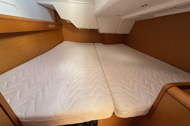 Slide: The Image of Cabin interior of 2013 Jenneau Sun Odyssey 379 with twin mattresses. - 44