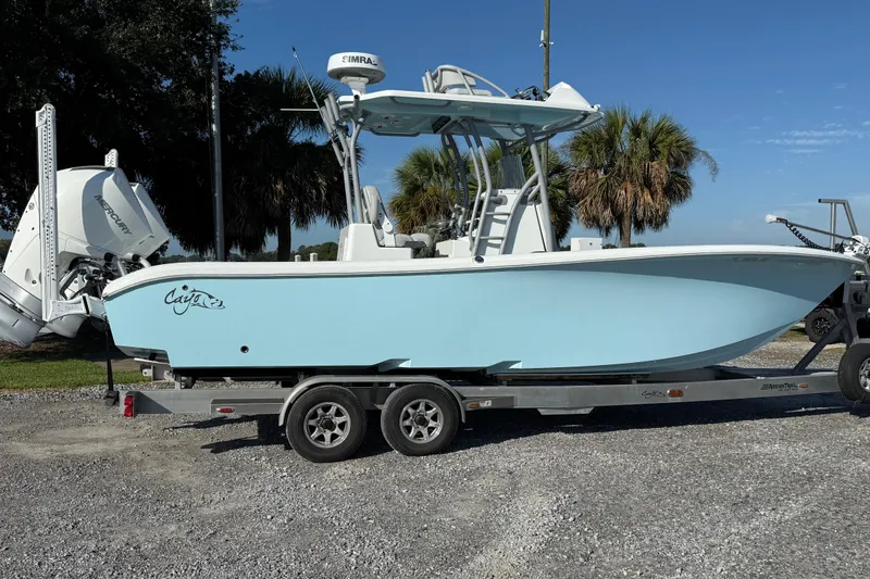 The Image of 2021 Costa Custom Boats 264 HC on trailer, light blue hull, parked outdoors. - 0