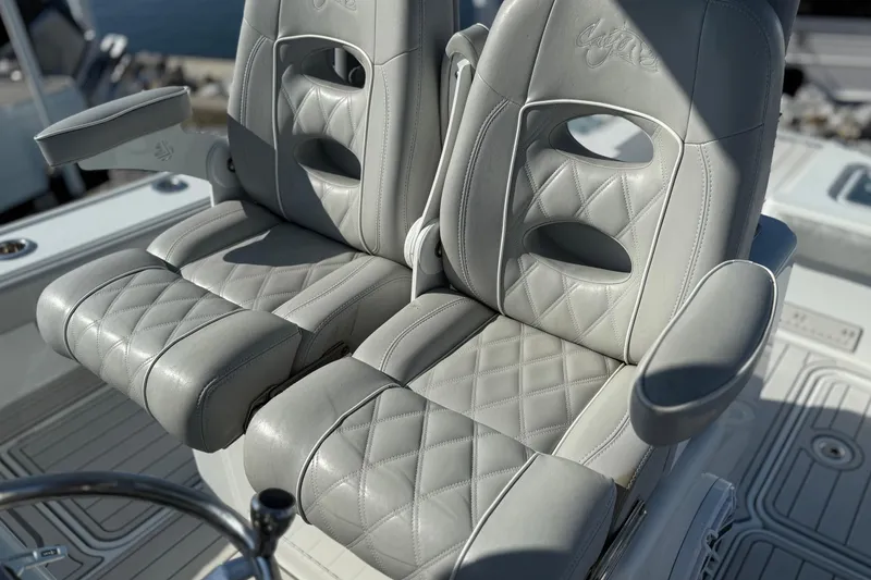 Slide: The Image of Luxurious seating on 2021 Costa Custom Boats 264 HC, featuring quilted leather design. - 13
