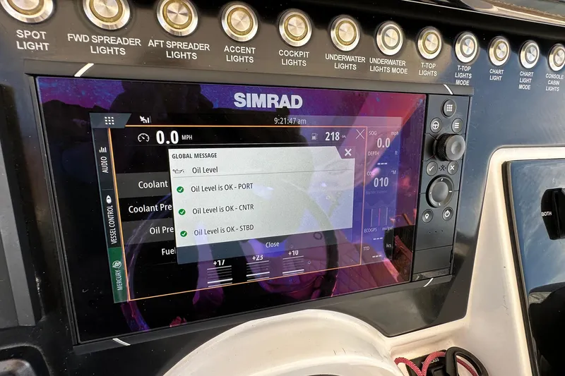 Slide: The Image of Simrad display on 2022 Fountain 38 CC LS showing oil levels and control panel. - 23