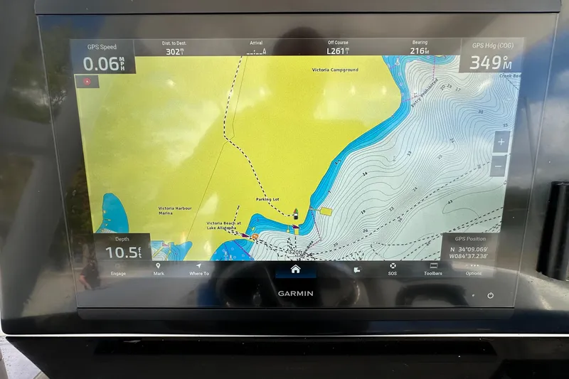 Slide: The Image of Garmin GPS display on 2022 Fountain 38 CC LS, showing navigation map and speed. - 24