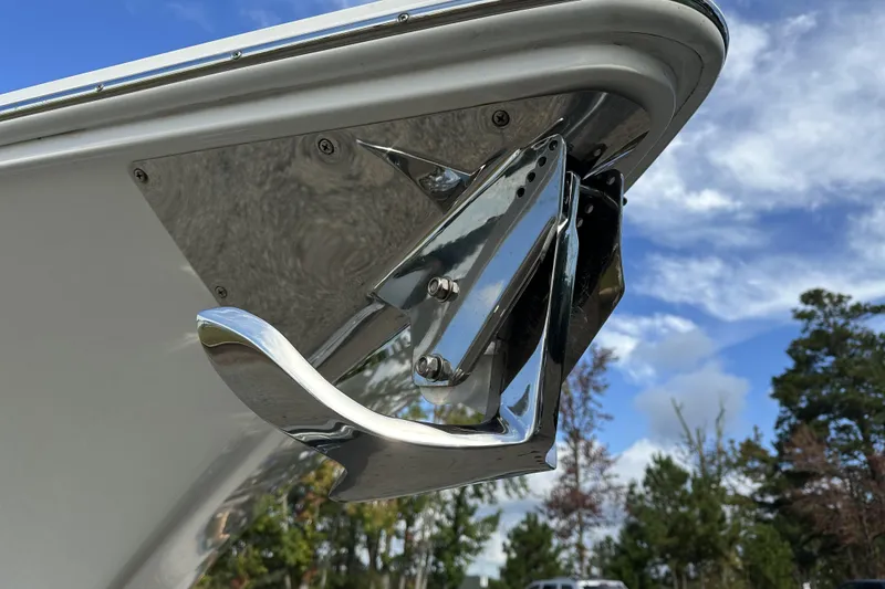 Slide: The Image of 2022 Fountain 38 CC LS boat anchor detail against a blue sky background. - 41