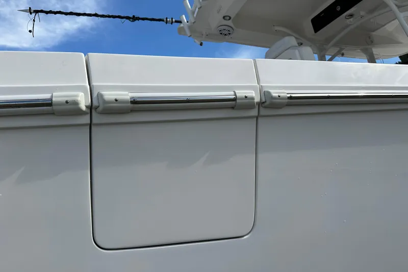 Slide: The Image of 2022 Fountain 38 CC LS boat detail with sleek white paneling and stainless steel hardware. - 43