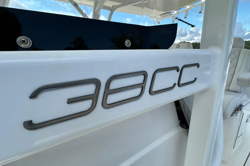 Slide: The Image of 2022 Fountain 38 CC LS boat, close-up of model name on white surface. - 49