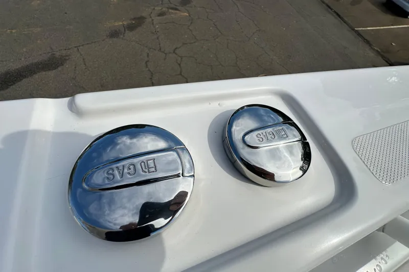Slide: The Image of Chrome fuel caps on 2022 Fountain 38 CC LS boat deck. - 50