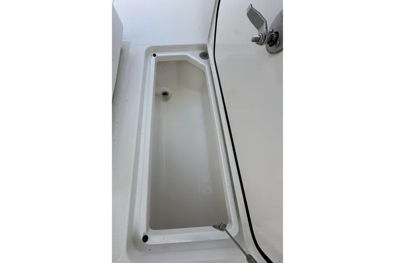 Slide: The Image of 2022 Fountain 38 CC LS boat storage compartment, open and empty. - 66