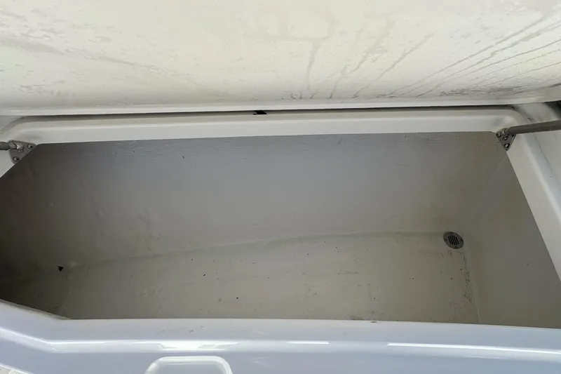 Slide: The Image of Open storage compartment on 2022 Fountain 38 CC LS boat. - 71