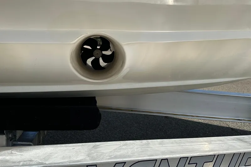 Slide: The Image of 2022 Fountain 38 CC LS boat hull with visible propeller detail. - 8