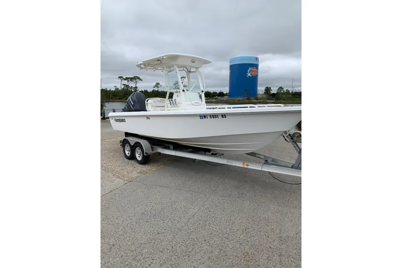 Slide: The Image of 2008 Everglades 223 Center Console boat on trailer, parked outdoors. - 30