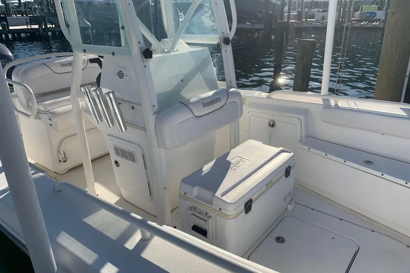 Slide: The Image of 2008 Everglades 223 Center Console boat interior with seating and storage. - 7