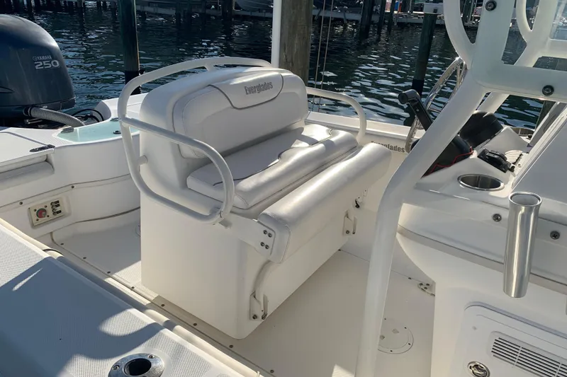 Slide: The Image of 2008 Everglades 223 Center Console boat interior with seating and Yamaha 250 engine. - 8