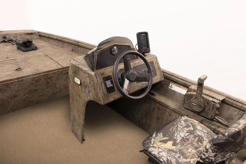 Slide: The Image of 2026 G3 17SC boat interior with camouflage design, featuring steering console and seating. - 2