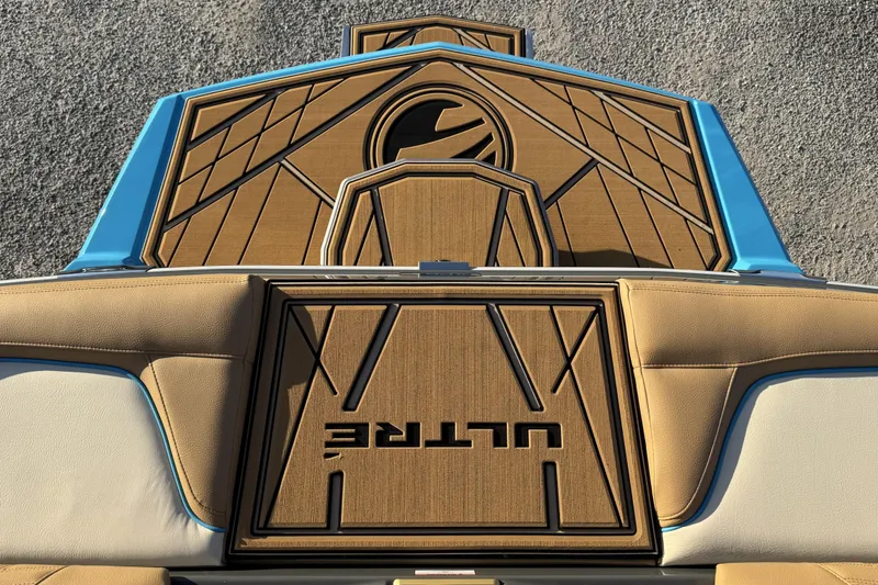 Slide: The Image of 2026 Tigé Ultré 25ZX boat deck with tan and blue design. - 19