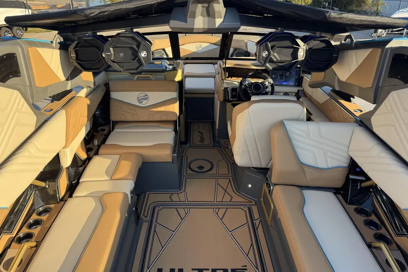 Slide: The Image of Luxurious interior of 2026 Tigé Ultré 25ZX boat with modern seating and advanced controls. - 20