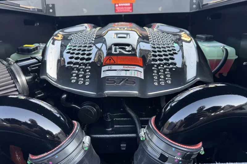 Slide: The Image of Engine of 2026 Tigé Ultré 25ZX boat, featuring Indmar 575 horsepower. - 23