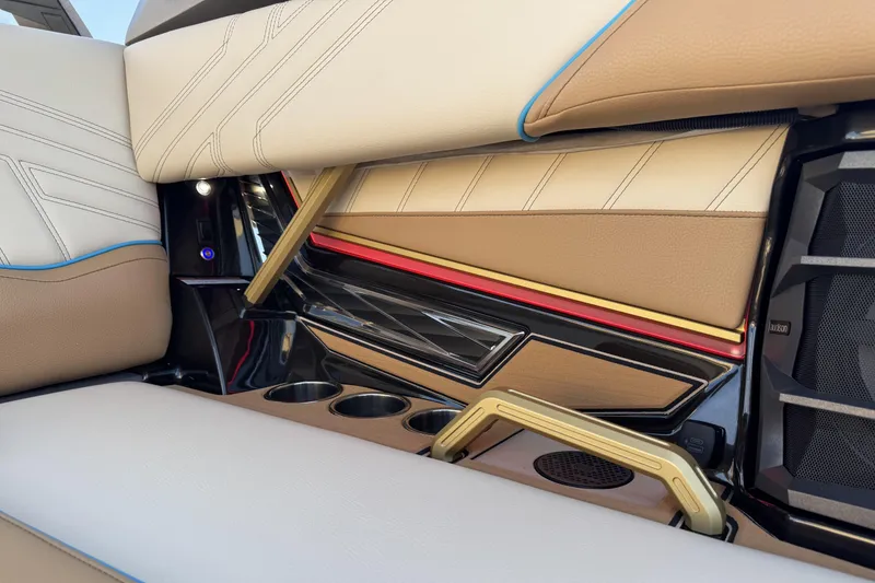 Slide: The Image of Luxurious interior of 2026 Tigé Ultré 25ZX boat with premium seating and cup holders. - 9