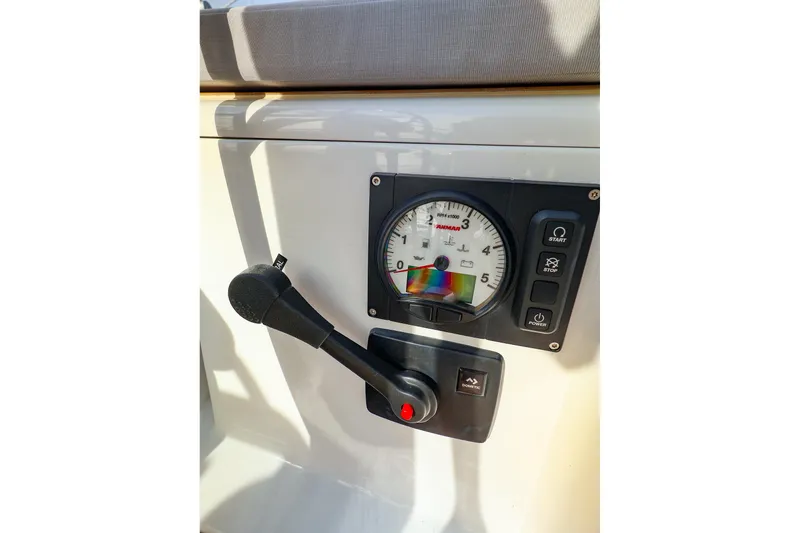 Slide: The Image of Control panel of 2025 Hanse 458 yacht with throttle and gauge. - 14