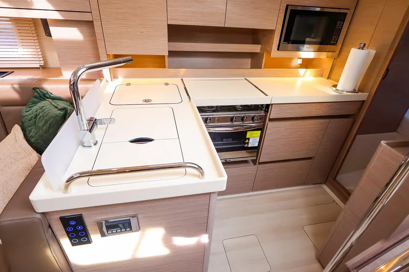 Slide: The Image of Modern kitchen interior of 2025 Hanse 458 yacht with sleek cabinetry and appliances. - 27