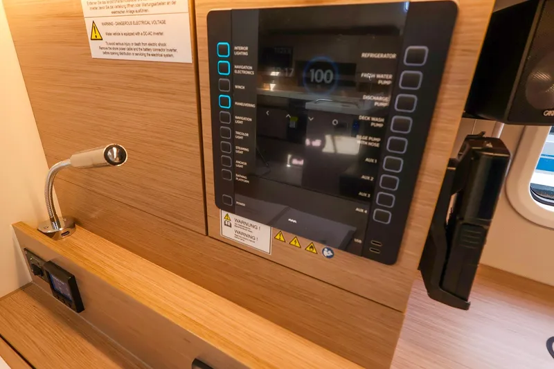 Slide: The Image of Control panel of 2025 Hanse 458 yacht with modern navigation and lighting systems. - 28