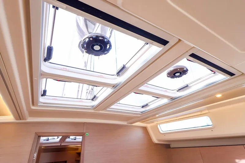 Slide: The Image of Interior view of 2025 Hanse 458 yacht skylights, showcasing modern design and natural lighting. - 29