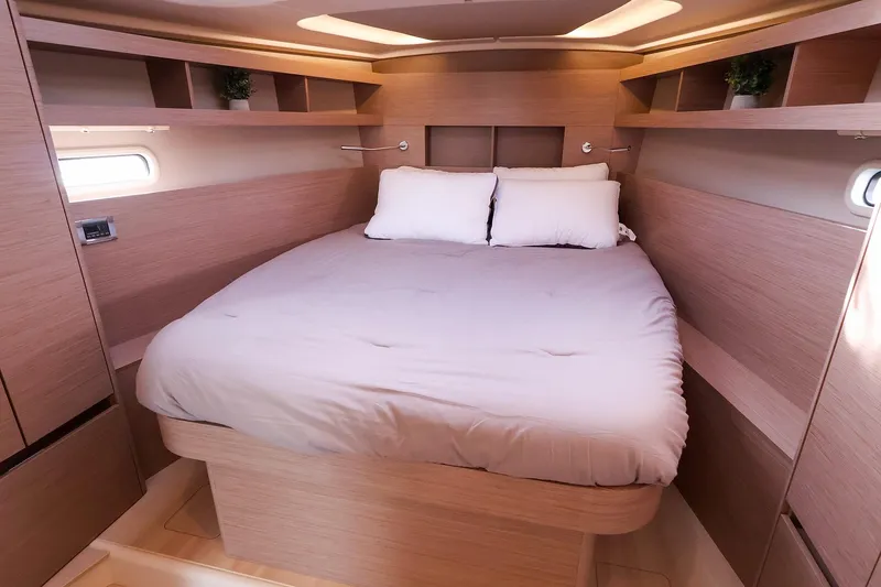 Slide: The Image of Luxurious interior cabin of 2025 Hanse 458 yacht with cozy bed and modern design. - 34