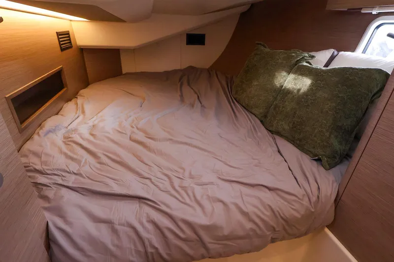 Slide: The Image of Cozy cabin interior of 2025 Hanse 458 yacht with comfortable bedding. - 37