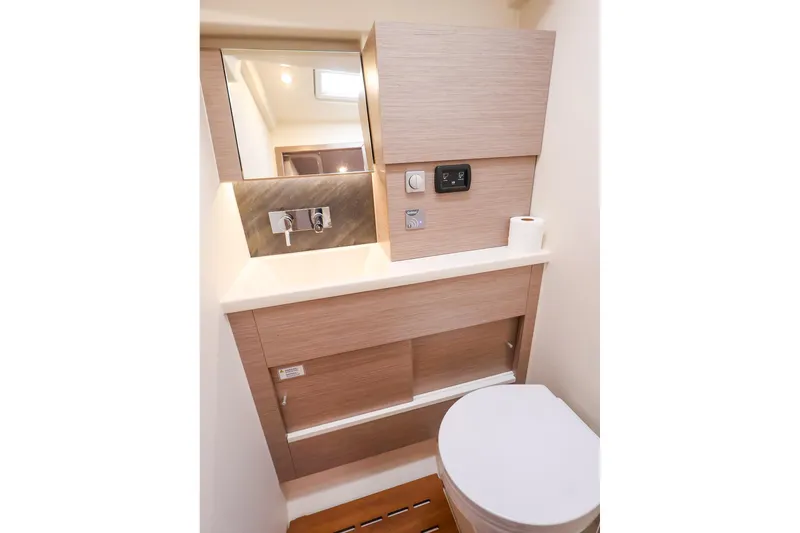 Slide: The Image of Modern bathroom in 2025 Hanse 458 yacht with sleek fixtures and wooden cabinetry. - 41
