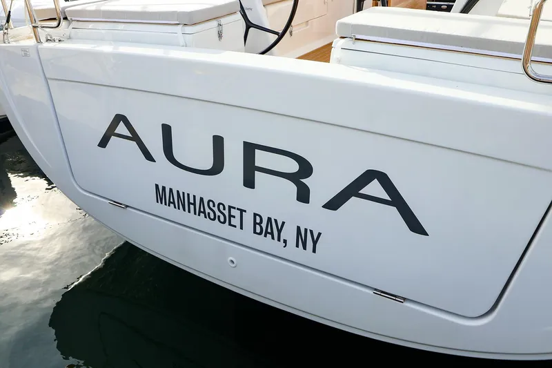 Slide: The Image of Stern of 2025 Hanse 458 yacht "Aura" docked at Manhasset Bay, NY. - 8
