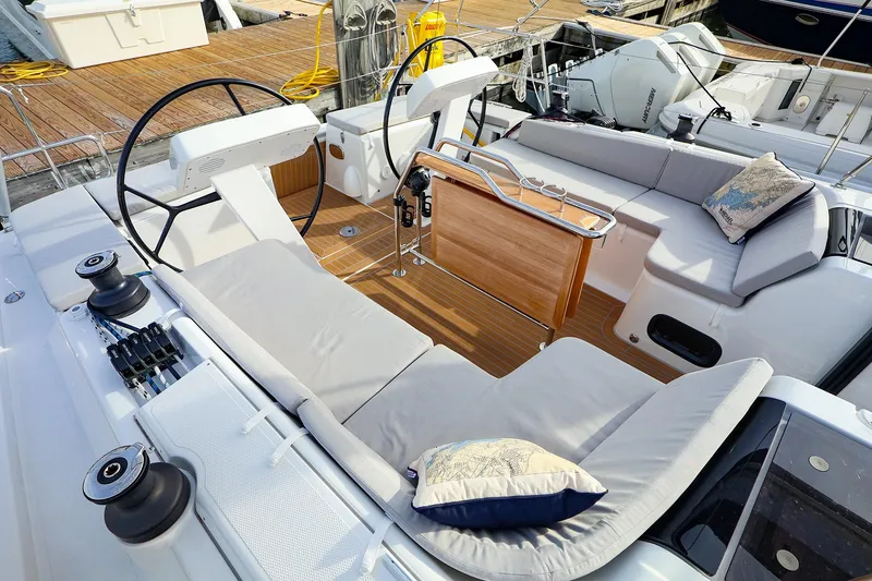 Slide: The Image of Luxurious 2025 Hanse 458 yacht interior with comfortable seating and modern design. - 9